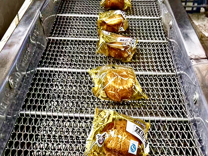 Chain-driven spiral conveyor belt